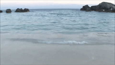 Animated GIF of ripples spreading across blue ocean water